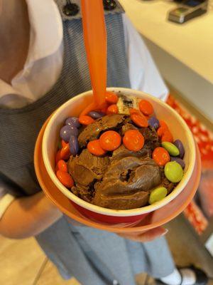 Scoop chocolate brownie fudge and Scoop cookies and cream...with M&Ms