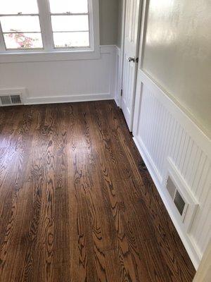 Family - replaced bead board & trim also finished the floors which were painted white