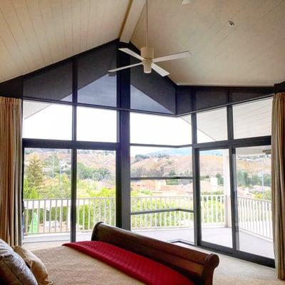 House 8 master bedroom bedroom overlooking the balcony and pool