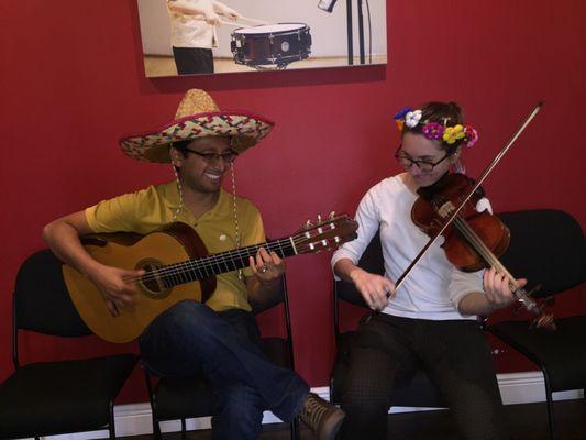 Instructors Johnny & Lily practicing "Fiesta style" while waiting for their next students to arrive.