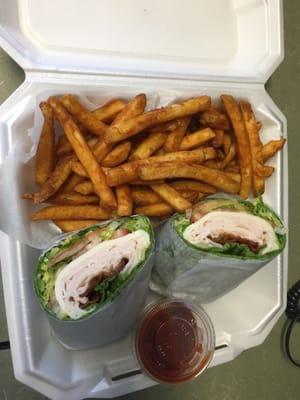 Turkey bacon wrap with provolone and a side of fries