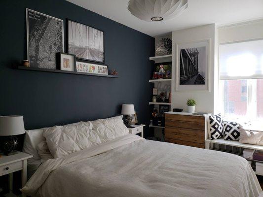 Benjamin Moore navy paint in bedroom.