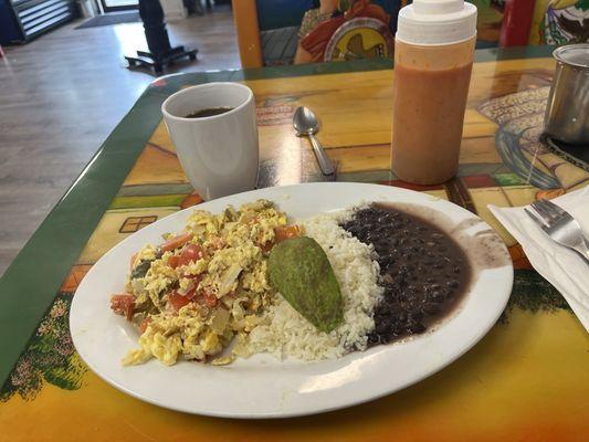 Same meal. Generous portioned eggs scrambled with red & green peppers & onions. Mmmm. A slice of Avocado rice & black beans.