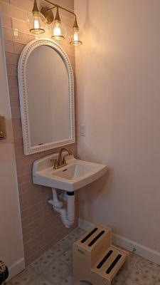 The bathroom in the main room - very cute and very clean And a step stool for a little ones!