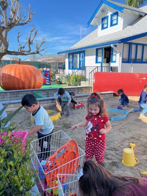 Students having fun in the sand yard!