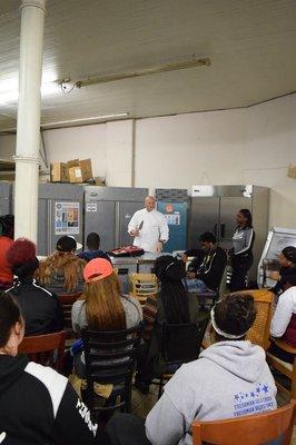 Ypsilanti Schools students recieve lunch and a demonstration from Dorsey Schools Chef @ Peoples Restaurant Equipment Company.