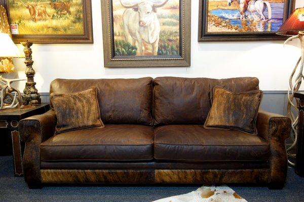 An exceptional leather couch with Brindle Cowhide