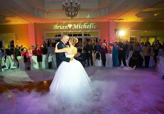 Party Time lighting & entertainment, "Your Name in Lights" custom projected monogram and "Dancing on Clouds" first dance decor.