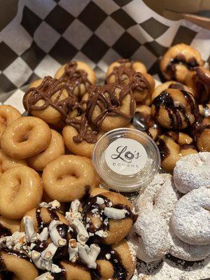 Treat yourself! Order Donut Mind if I do box. This box serves up to 4 people. Call to place order.