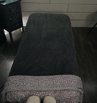 Massage table