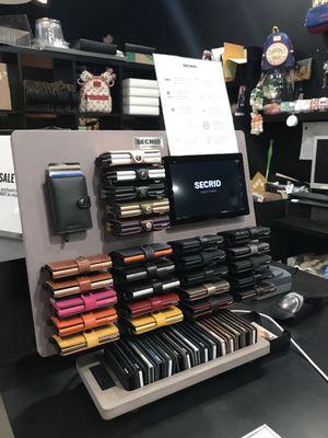 Secrid wallet display at the register counter