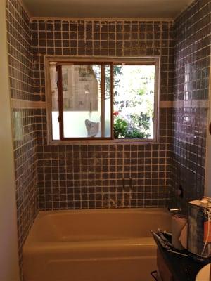 Before: Awful Stripped tub and tile