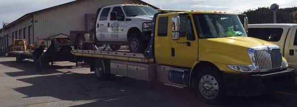 Large pickup with 45' 5th wheel trailer. We are summit counties preferred towing for light and medium duty vehicles.