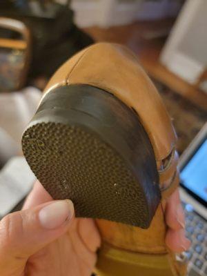 Shoe polish from the heel heel added on the leather.