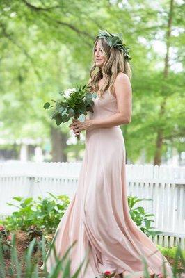 Love the simple elegance of the blush dress with greenery at Haywood Hall. This flower crown is the perfect touch for this bridesmaid!