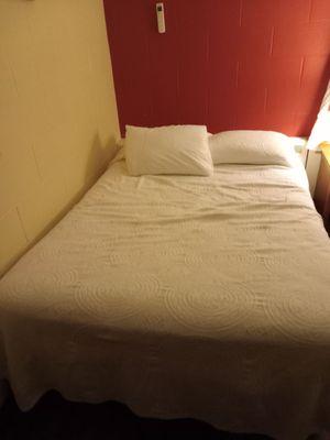 Full bed in single occupancy room