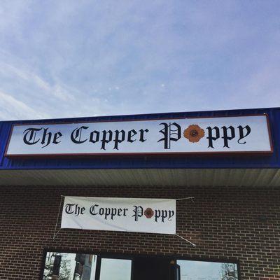 The Copper Poppy sign