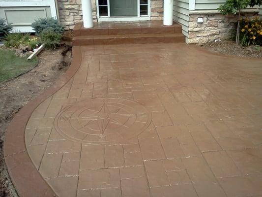 A nice stamped concrete sidewalk.