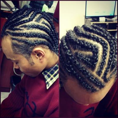 Cornrows on wavy hair texture.