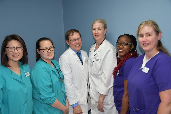 Drs. George Woodbury&Cathy Chapman with the Rheumatology&Dermatology healthcare team