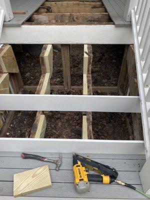 Stairs replacing rotted wood