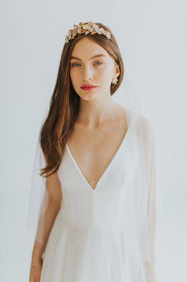 Sexy neckline in linen wedding dress by indie bridal designer Elizabeth Dye. Exclusively available in Los Angeles at The Blushing Bird.