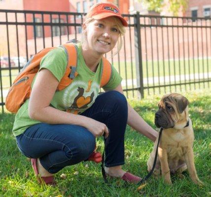 Emily the dog walker and her dog buddy, Max.  Having an awesome time walking to the park. Part of our super dogwalkers team.