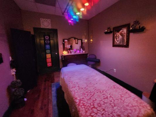 Massage suite with color therapy lights.