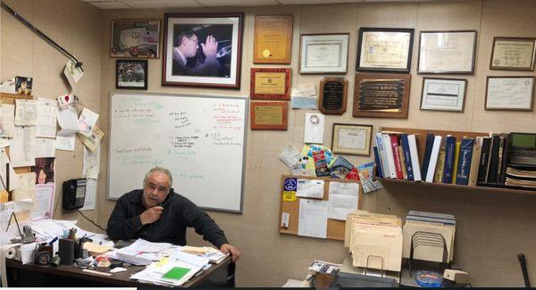 Joe Marotta at his desk in Ozone Park Queens,