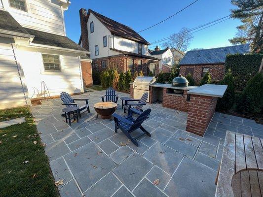 Bluestone Patio with custom outdoor kitchen.