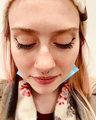 Nose piercings on both sides of nose and a septum piercing. Almost Famous Body Piercing in Billings, Montana