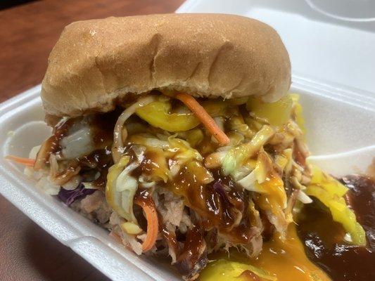 Slaw Hawg Pulled Pork Sandwich topped with Coleslaw, Sikes Southern BBQ LLC Food Truck, Motto "Eggceptionally Good", Tampa