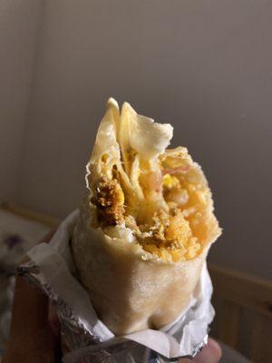 A very bad picture of a very good burrito.