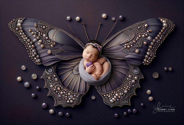 Newborn baby on butterfly