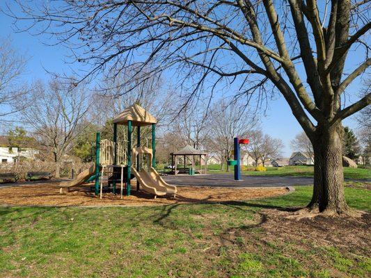 Small playground, basketball hoop, gazebo