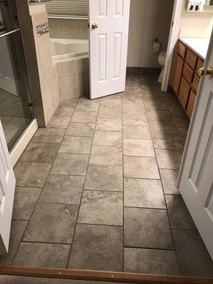 New tile floors going in to complete the bathroom remodel.