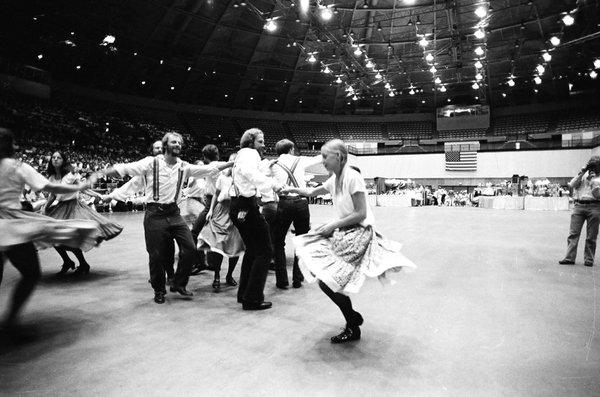 Kickapoo Cloggers.  In this formation, the men are at the center rotating counter clockwise, while the women at the periphery move clockwise