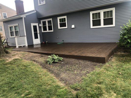 New vinyl siding on entire home and new Trex decking installed in backyard to enhance the exterior living space