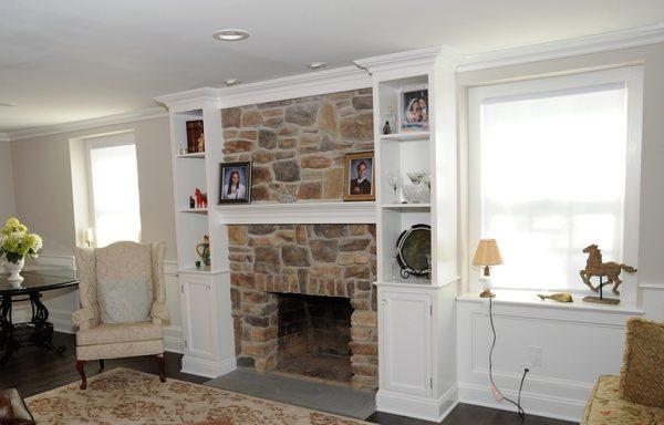 Rebuilt fireplace with custom cabinetry.