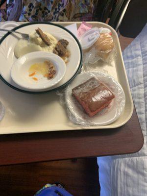 Diabetic dinner tray. She ate her carrots and beef. She left the Strawberry cake with sugary glaze, mashed potatoes, bread.