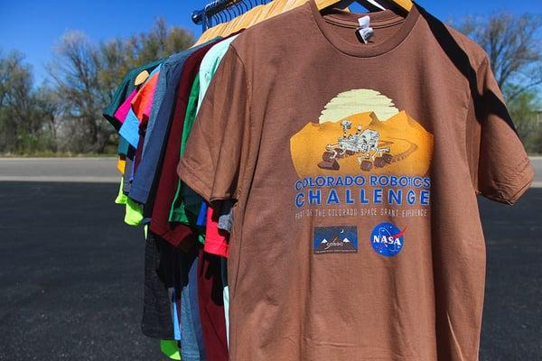 Custom 6-color design for Colorado Space Grant Consortium featuring high detail halftone gradients and ultra soft ringspun garment dyed tees