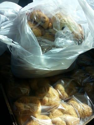 30 croissants for 3 bucks and 12 chocolate croissants for 3 bucks!  They charge 2.50 each at Starbucks!