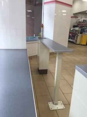 Tables for people to eat/stand/sit on