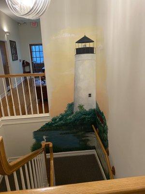 Painting of the St. Marks lighthouse at the staircase