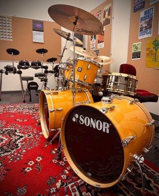 Center drum set in jam room