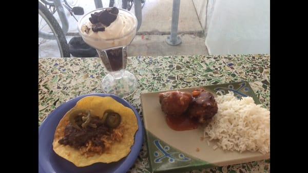 Black bean tostada with jalapeños and Mexican rice, Oreo parfait, lion's head meatballs with white rice