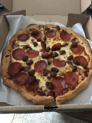 Small pepperoni and sausage pizza