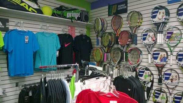 Racquets span the entire wall of the store. Easily 100 sticks