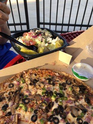 Greek salad and pizza