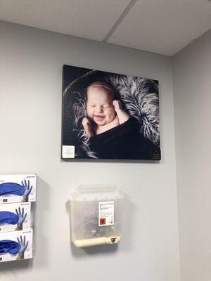 Cute baby pictures in the exam room.